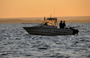 A fishing boat at sunset
